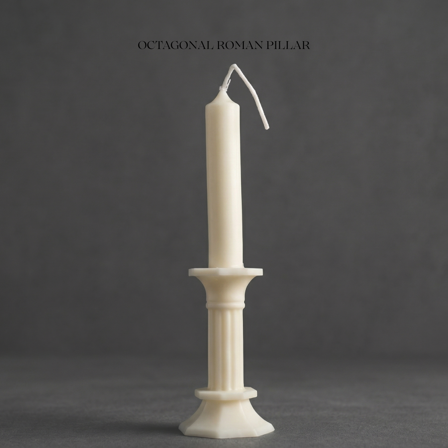 Decorative candle holder with a candle on a dark background