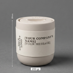 Beige ceramic container with customizable text on a gray background