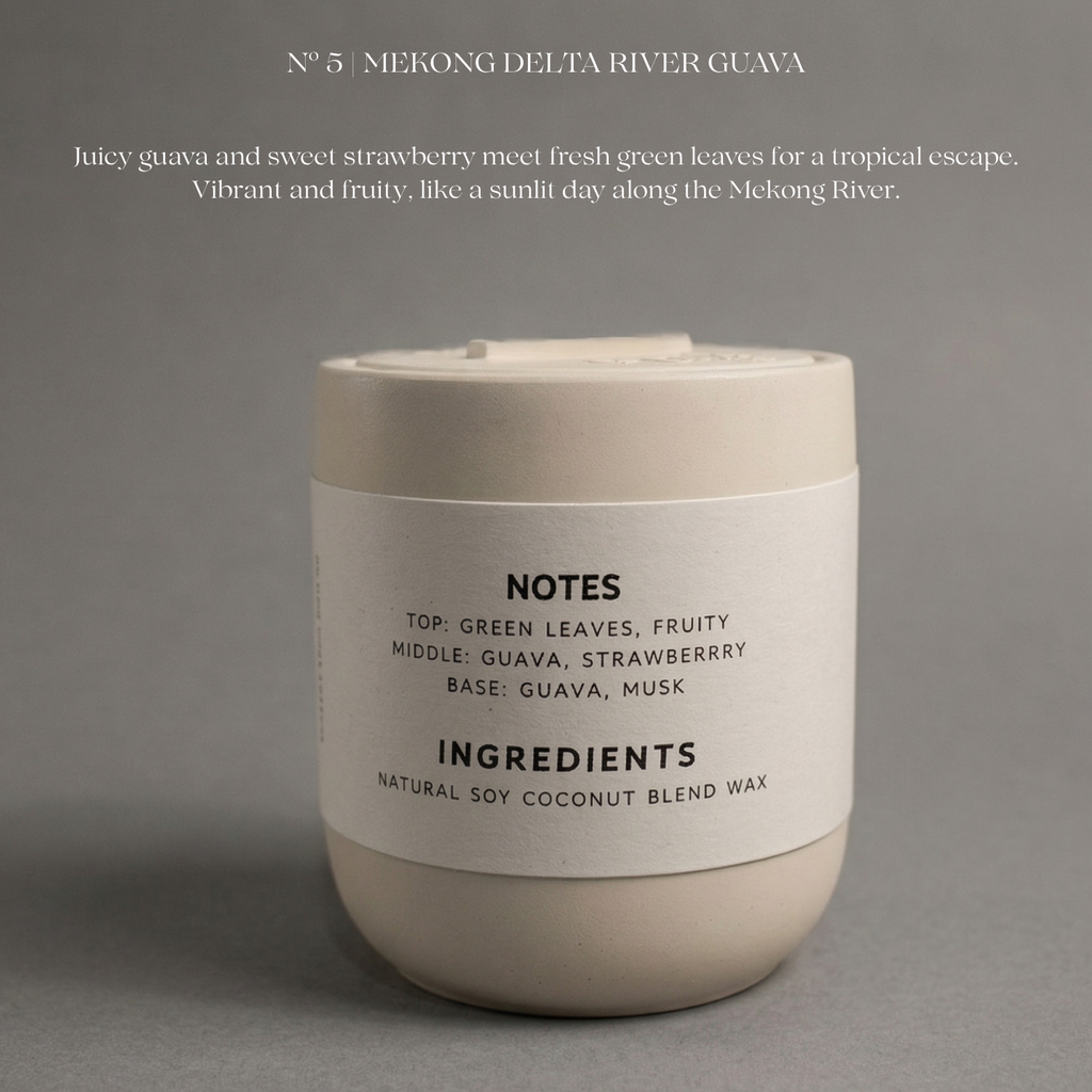Candle with label on a gray background