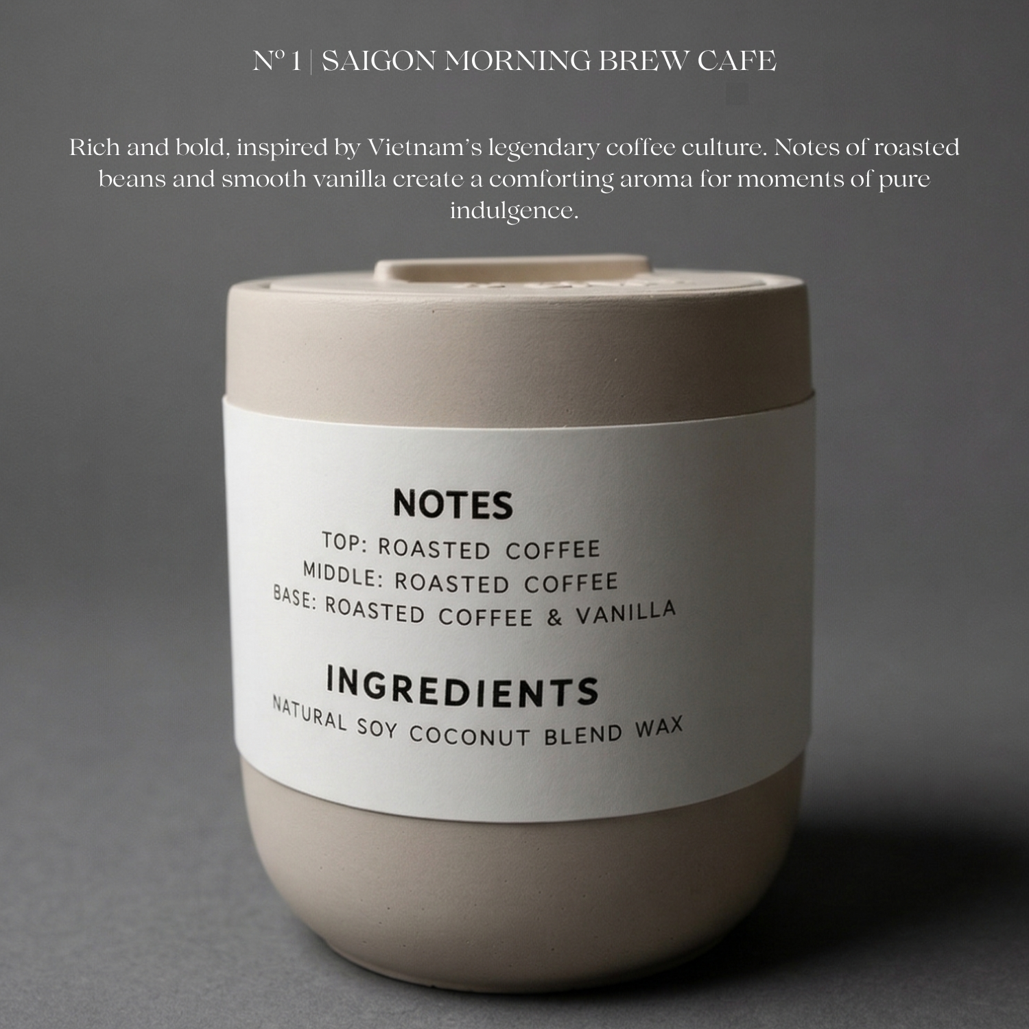 Candle with a label on a gray background, featuring details about the candle's notes and ingredients.